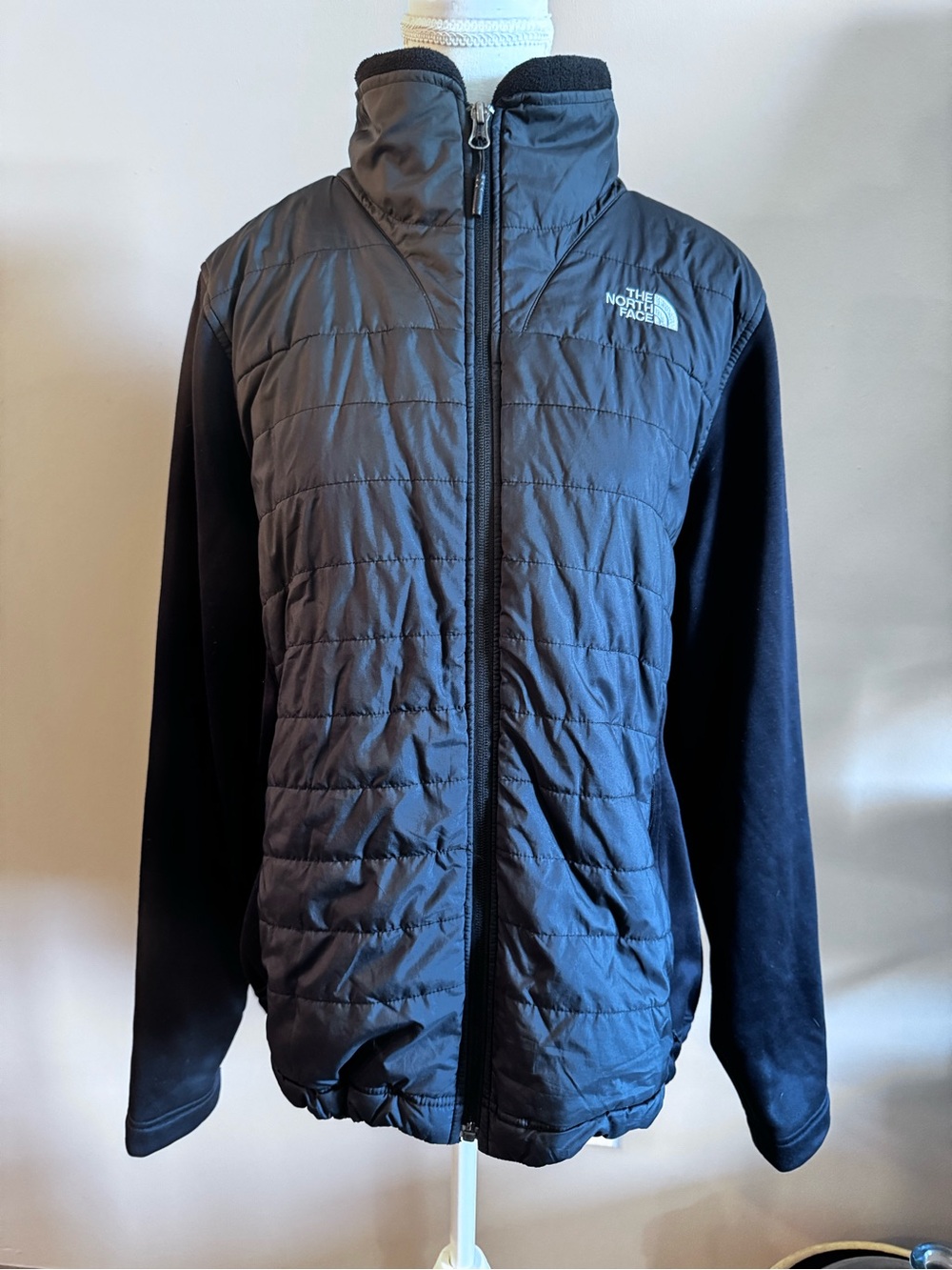 The North Face Black Quilted Front Performance Jacket with Knit Sleeves